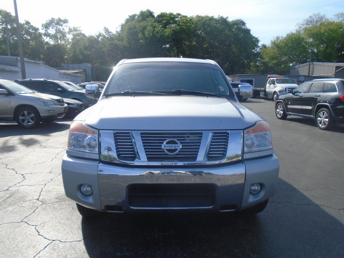 2012 Silver /Grey Nissan Titan SV Crew Cab 2WD (1N6BA0ED4CN) with an 5.6L V8 DOHC 32V FFV engine, 5-Speed Automatic transmission, located at 6112 N Florida Avenue, Tampa, FL, 33604, (888) 521-5131, 27.954929, -82.459534 - Photo#1